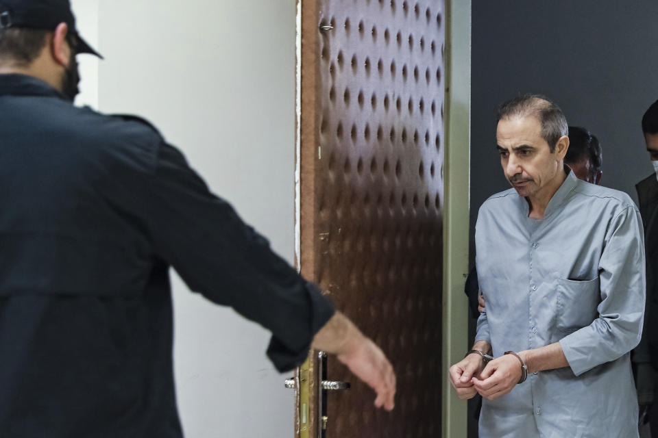 In this photo released by Mizan News Agency on Oct. 25, 2022, Iranian-Swedish dual national Farajollah Cha'ab arrives at a courtroom at the Revolutionary Court in Tehran, Iran. Iran executed Cha'ab Saturday, May, 6, 2023, accused of masterminding a 2018 attack on a military parade that killed at least 25 people, one of several enemies of Tehran seized abroad in recent years amid tensions with the West. (Koosha Mahshid Falahi/Mizan News Agency via AP)