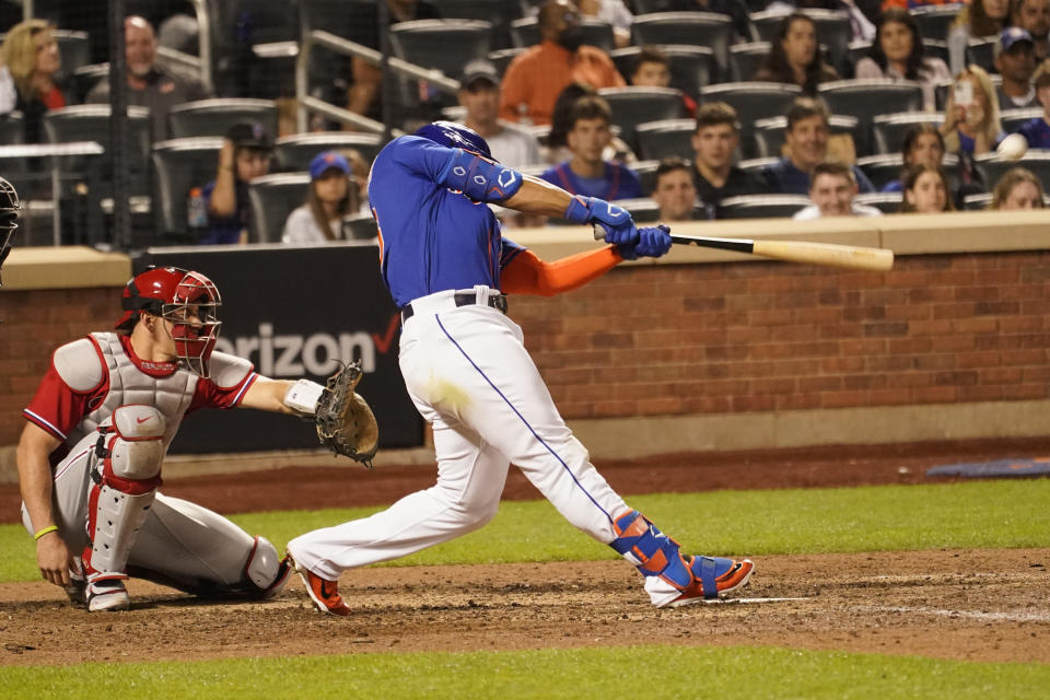 New York Mets' Nick Plummer hits a game-tying home run for his first major league hit during the ninth inning of a baseball game against the Philadelphia Phillies, Sunday, May 29, 2022, in New York. (AP Photo/Mary Altaffer)