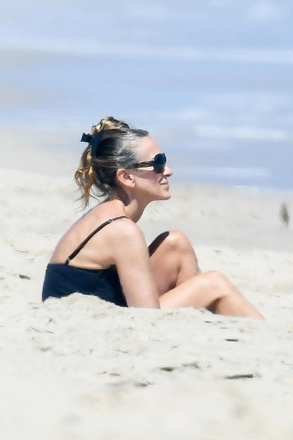 <p>Sarah Jessica Parker soaks up the sunshine on Thursday during a beach visit in The Hamptons, New York.</p>