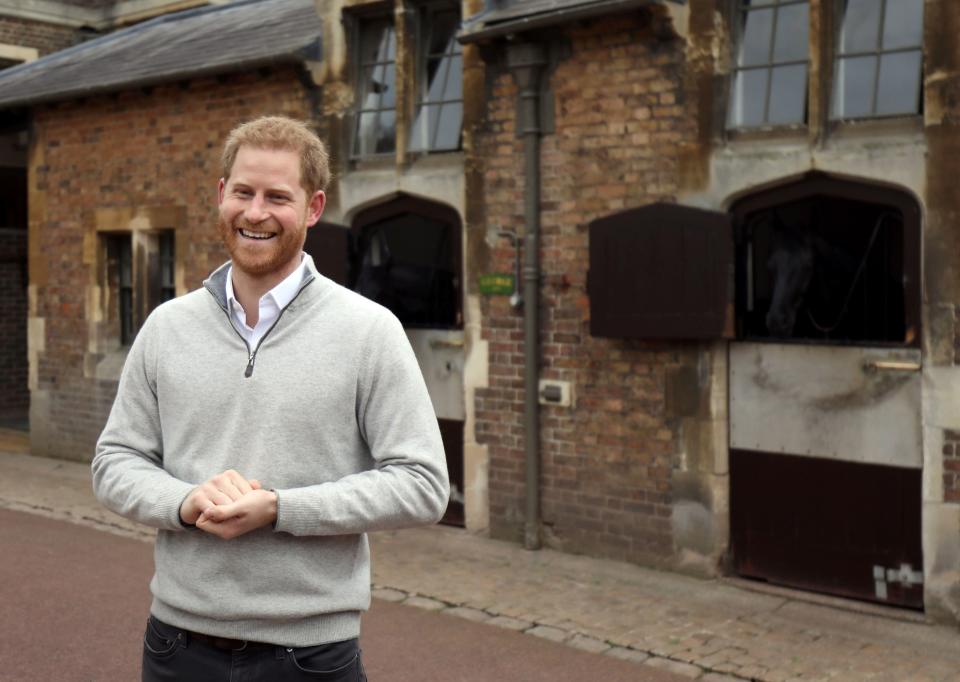 Prince Harry beams as he speaks to reporters at Windsor Castle on May 6, 2019, announcing that his wife, Duchess Meghan, had given birth to a 