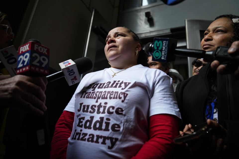 Eddie Irizarry's aunt Ana Cintron speaks with members of the media after a judge has reinstated all charges, including a murder count, against former police officer Mark Dial, in Philadelphia, Wednesday, Oct. 25, 2023. Dial on Aug. 14, shot and killed Irizarry during a during a traffic stop. (AP Photo/Matt Rourke)