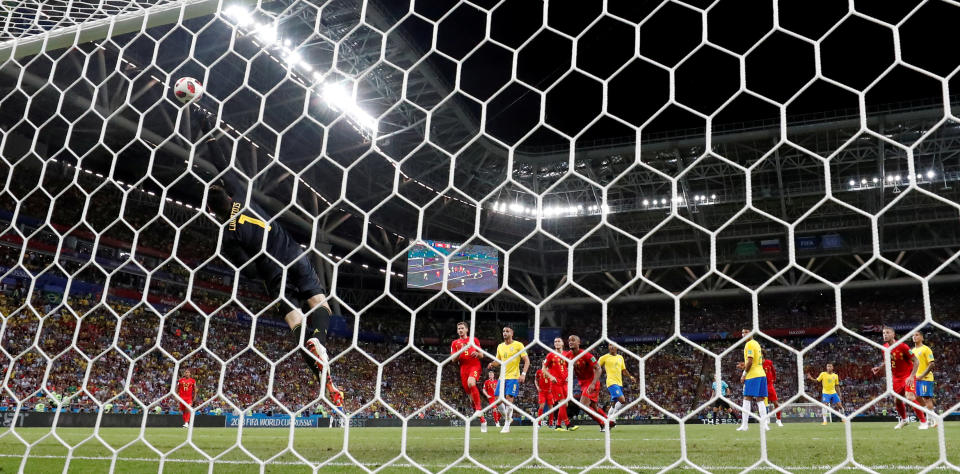 Courtois made full use of his 6ft5 frame to save this shot from Neymar in the quarter final