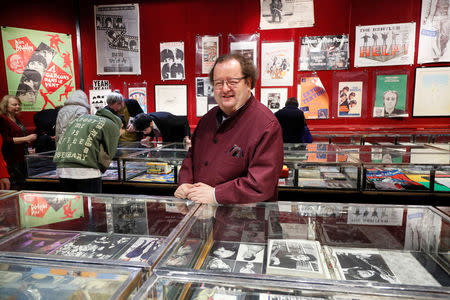 French Beatles specialist and collector Jacques Volcouve, one of the world's greatest living experts of the band, poses among the 15,000 items going on sale on March 18 at Drouot auction house in Paris, March 16, 2017. REUTERS/Charles Platiau