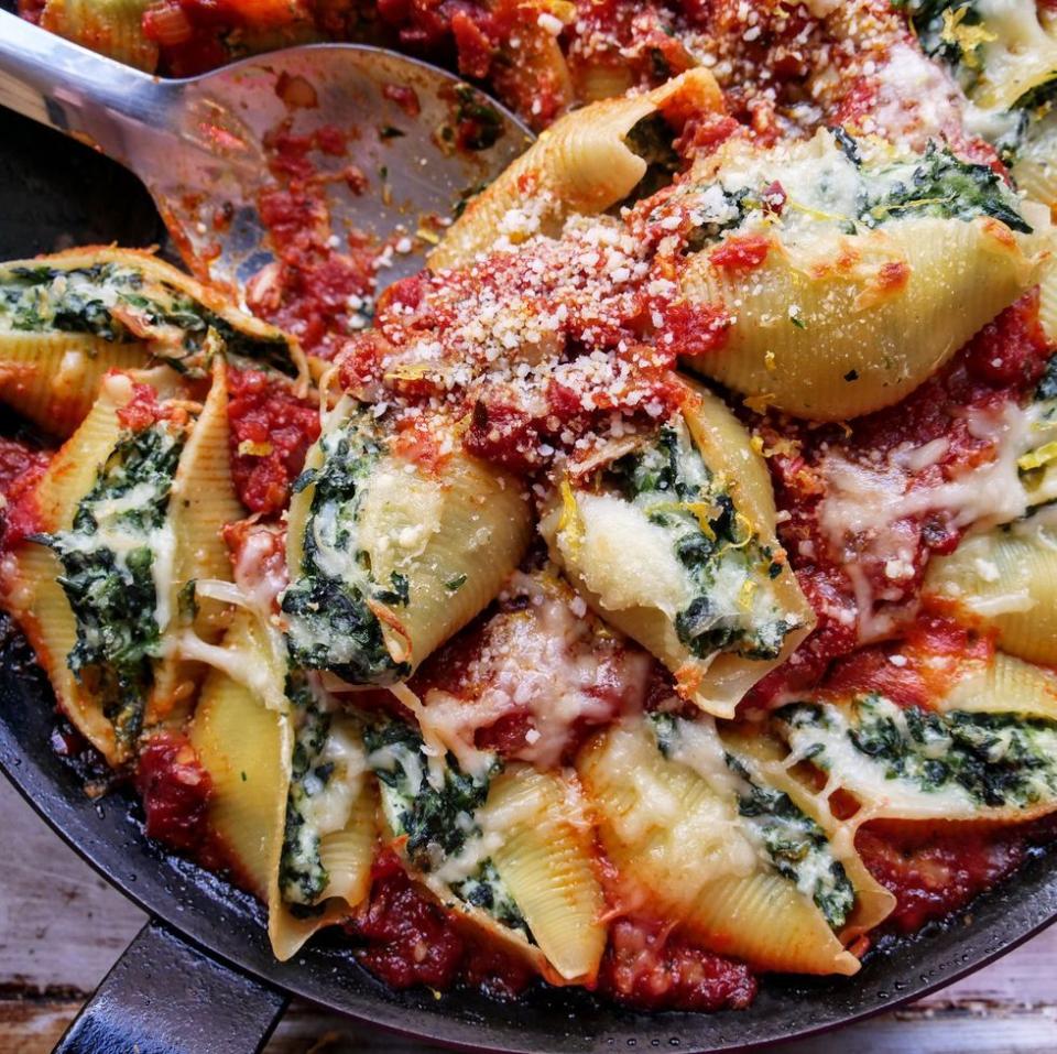 <p>This hearty pasta dish combines two inexpensive kitchen staples–pasta and frozen spinach. You’re going to be so happy you prepped this classic pasta dish ahead of time, especially when you’re craving some comfort food after a long day. </p><p>Get the <a href="https://www.delish.com/cooking/recipe-ideas/a37796304/stuffed-shells-with-spinach-recipe/" rel="nofollow noopener" target="_blank" data-ylk="slk:Stuffed Shells With Spinach;elm:context_link;itc:0" class="link ">Stuffed Shells With Spinach</a> recipe from Delish.</p>