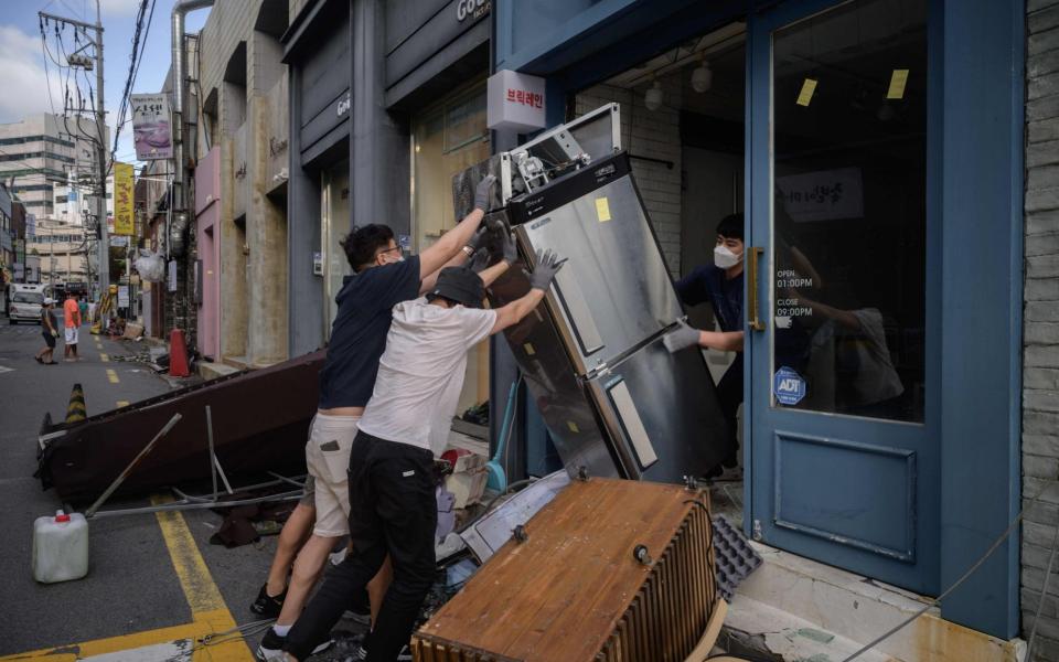 Must of the region is still recovering from Typhoon Bavi - GETTY IMAGES