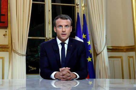 French President Emmanuel Macron is seen before his first long live television interview on prime time at the Elysee Palace in Paris, France, October 15, 2017. REUTERS/Philippe Wojazer