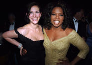 <p>Roberts grabbed a quick pic at the Governors Ball with pal Oprah Winfrey on February 27, 2005. The two became friends during her many — <a href="http://www.oprah.com/oprahshow/Top-15-Most-Frequent-Celebrity-Guests/10" rel="nofollow noopener" target="_blank" data-ylk="slk:over 20!;elm:context_link;itc:0;sec:content-canvas" class="link ">over 20!</a> — appearances on the <i>Oprah </i>show. (Photo: Jeff Kravitz/FilmMagic)</p>