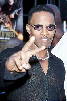 Jamie Foxx , star of the Oscar-caliber motion picture saga known as " Booty Call ," at the LA premiere for Wild Wild West Photo by Jeff Vespa