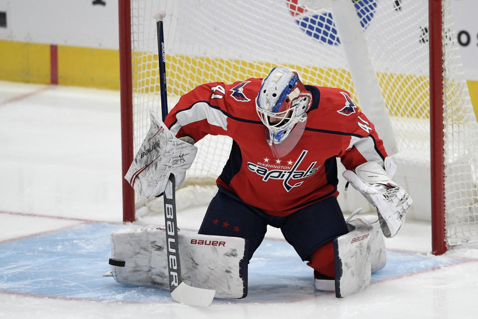 Washington Capitals goaltender Vitek Vanecek (41) stops the puck during the first period of an NHL hockey game against the Buffalo Sabres, Friday, Jan. 22, 2021, in Washington. (AP Photo/Nick Wass)