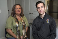 Zach Berly and his mother, Jennifer Wise, are photographed in his home in Fuquay-Varina, N.C., Friday, Sept. 25, 2020. They avoid talking about Donald Trump, politics or the coronavirus. They were both Trump supporters in 2016. Now only one of them is. (AP Photo/Gerry Broome)