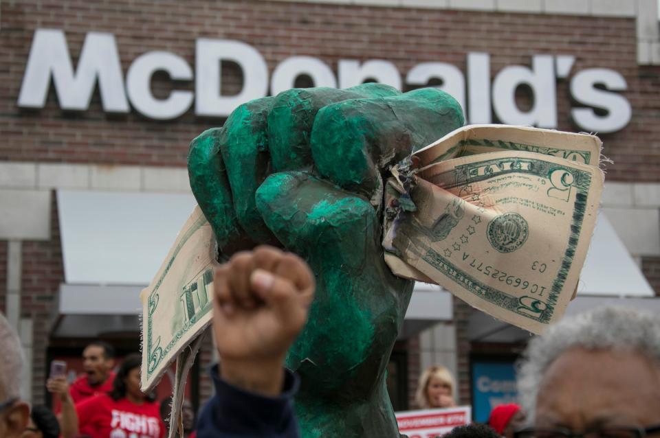 A McDonald strikers rally for an increase to the minimum wage on in front of McDonalds on Woodward Ave. is captured on Tuesday, Oct. 2, 2018.