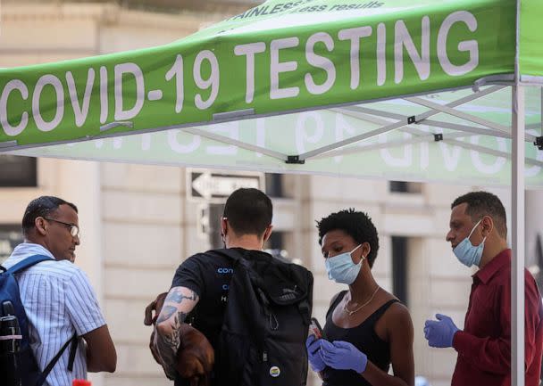 PHOTO: In this July 11, 2022, file photo, people wait to take COVID-19 tests at a pop-up testing site in New York.  (Brendan McDermid/Reuters, FILE)