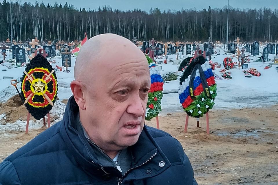 Wagner Group head Yevgeny Prigozhin attends the funeral of Dmitry Menshikov, a fighter of the Wagner group who died during a special operation in Ukraine, at the Beloostrovskoye cemetery outside St. Petersburg, Russia, Saturday, Dec. 24, 2022.