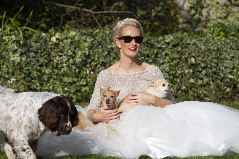 The 33-year-old made sure to include her four-legged friends in the big day [Photo: Caters]