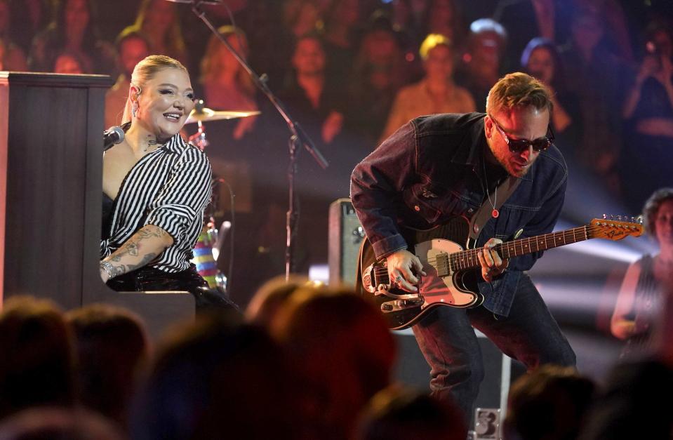 Elle King, left, and Dan Auerback, of The Black Keys, perform "Great Balls of Fire" during a tribute to the late Jerry Lee Lewis during the 56th Annual CMA Awards, at the Bridgestone Arena in Nashville, Tenn 56th Annual CMA Awards - Show, Nashville, United States - 09 Nov 2022