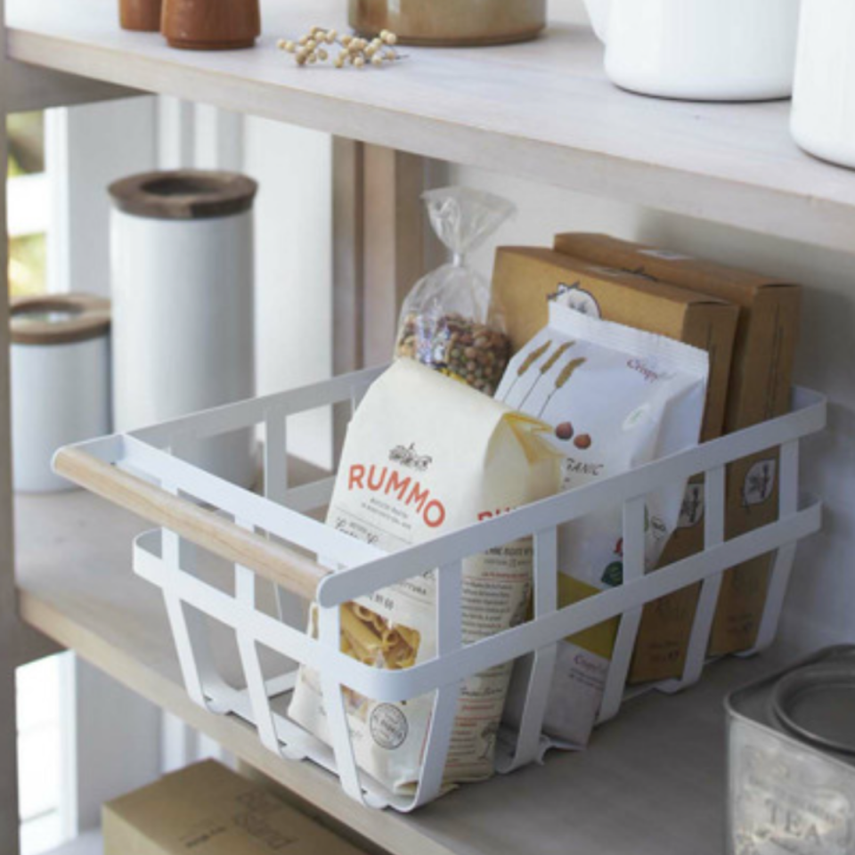 White Yamazaki Metal & Wood Storage Basket from Temple & Webster pictured on a shelf with pasta.