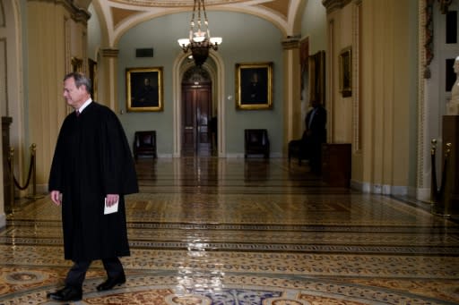 Supreme Court Chief Justice John Roberts, seen entering the US Senate to convene the court of impeachment, will preside over the impeachment trial of President Donald Trump