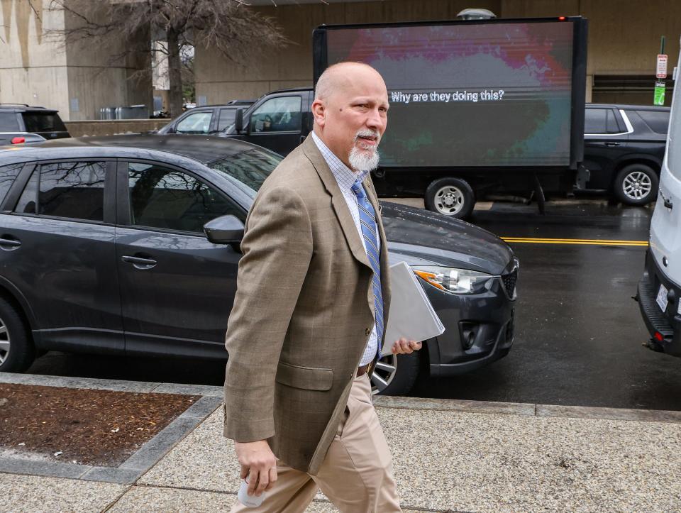 Rep. Chip Roy, R-Texas, arrives at the Thomas P. O'Neil Jr. House Office Building to attend a closed door deposition as a mobile billboard sponsored by the Congressional Integrity Project drives past him in the background on February 28, 2024 in Washington DC.