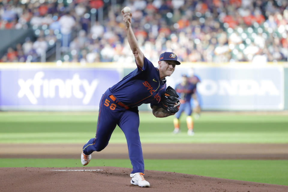 Houston Astros starting pitcher Hunter Brown throws against the Texas Rangers during the first inning of a baseball game Monday, Sept. 5, 2022, in Houston. (AP Photo/Michael Wyke)