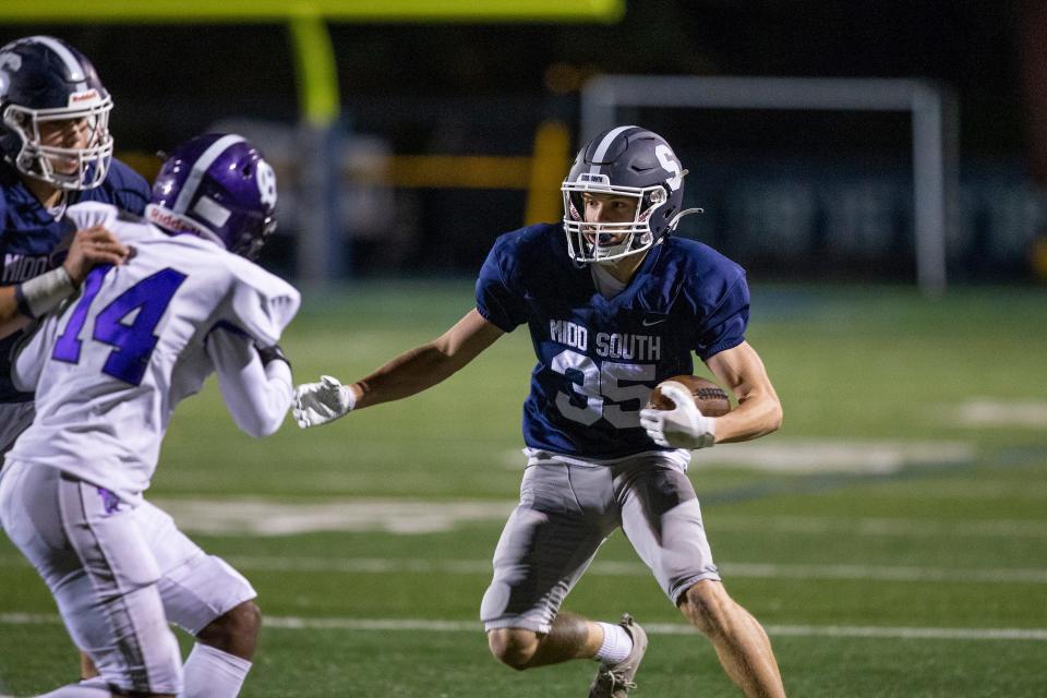 Middletown South's Jesse Burbank runs the ball during the first half of the Cherry Hill West vs. Middletown South NJSIAA Central Group 4 playoff football game at Middletown High School South in Middletown, NJ Friday, October 28, 2022. 