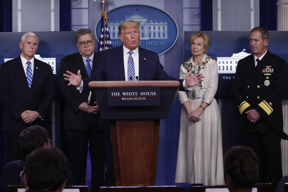 President Donald Trump takes questions from reporters as he speaks about the coronavirus in the James Brady Briefing Room, Monday, March 23, 2020, in Washington. Listens from left are Vice President Mike Pence, Attorney General William Barrm Dr. Deborah Birx, White House coronavirus response coordinator, and Navy Rear Adm. John Polowczyk, supply chain task force lead at FEMA, (AP Photo/Alex Brandon)