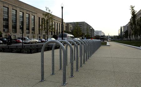 Empty bicycle racks are seen in the Federal Center Plaza area during day three of the U.S. government shutdown in Washington October 3, 2013. REUTERS/Gary Cameron