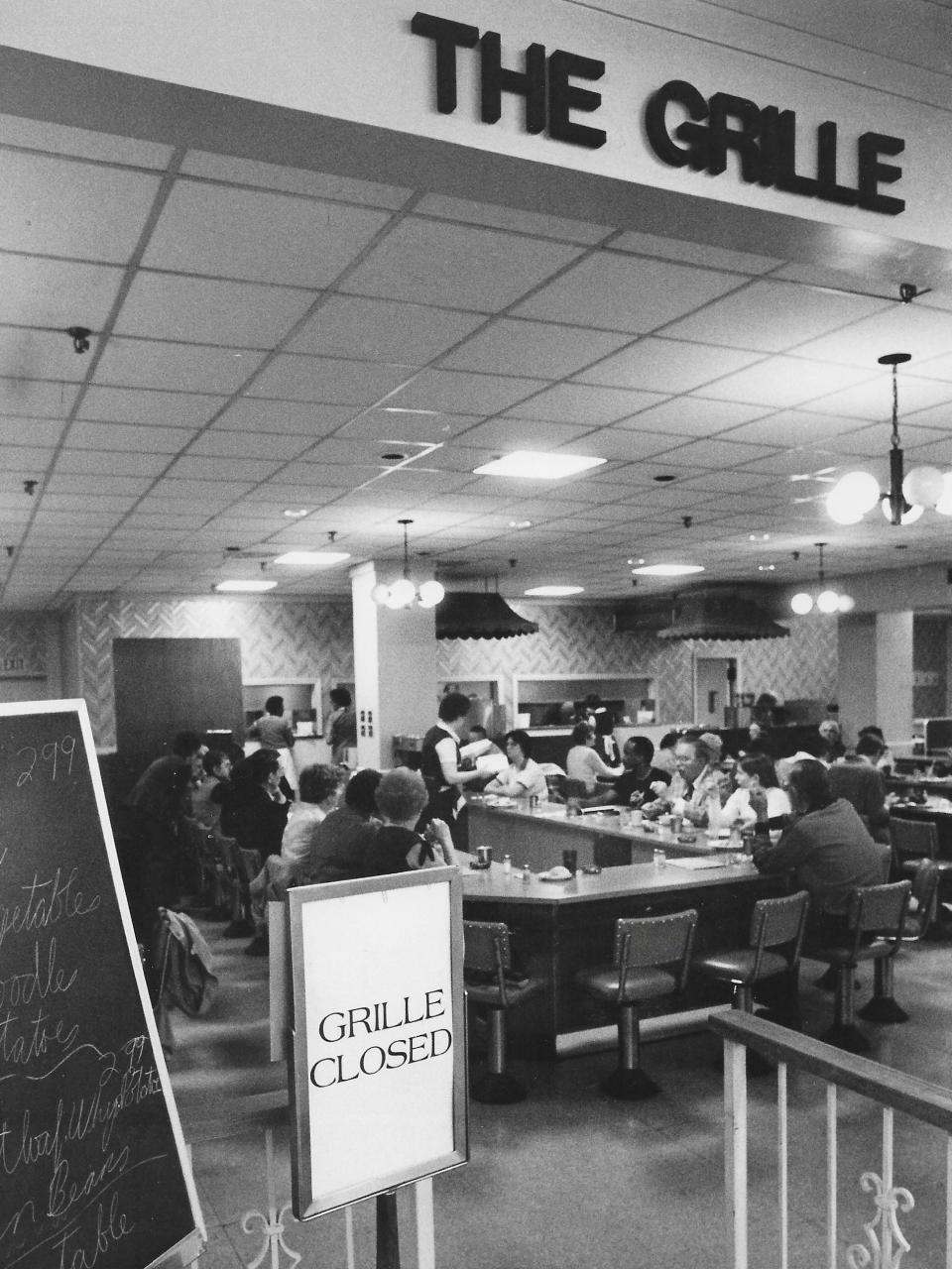 The sign says it all May 29, 1984, on the final day of the Oak Grille at O’Neil’s department store in downtown Akron.