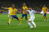 KIEV, UKRAINE - JUNE 19: Franck Ribery of France is challenged by Olof Mellberg of Sweden during the UEFA EURO 2012 group D match between Sweden and France at The Olympic Stadium on June 19, 2012 in Kiev, Ukraine. (Photo by Lars Baron/Getty Images)