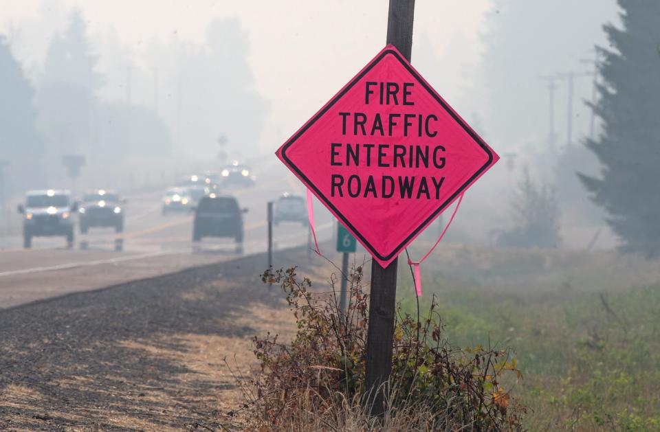 Smoke from the Bedrock Fire hangs in the air along Highway 58 east of Eugene.