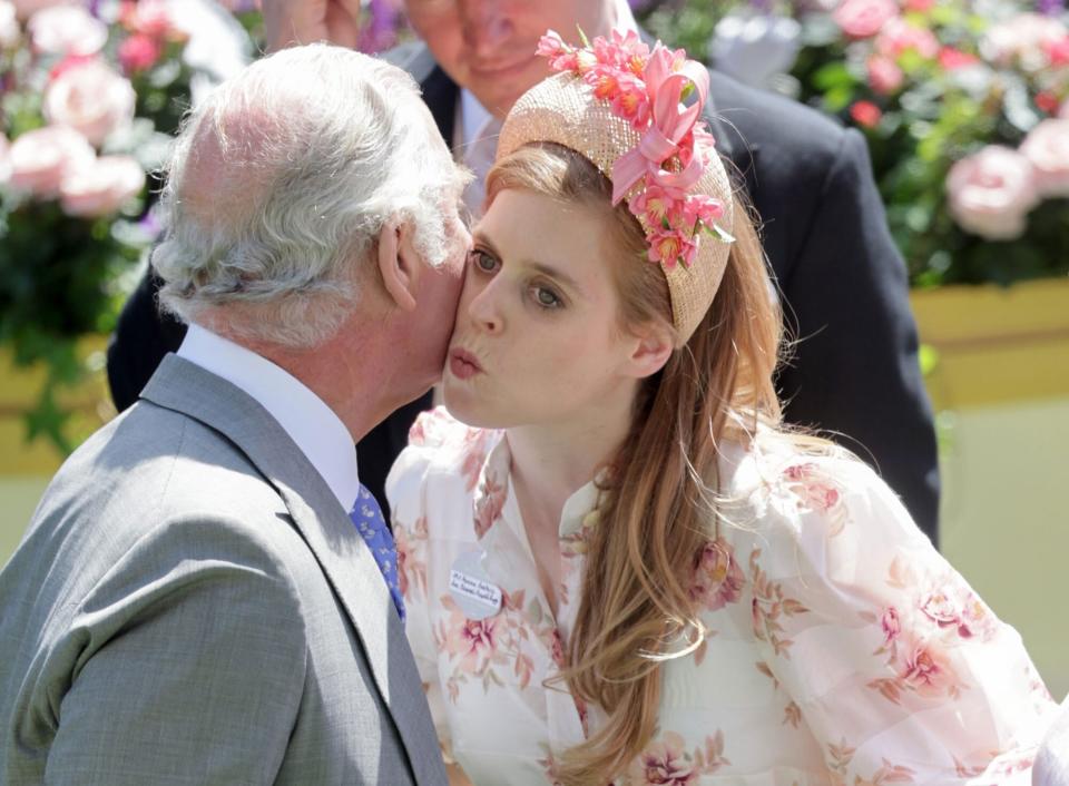 ASCOT, ENGLAND - JUNE 14: Prince Charles, Prince of Wales, greets Princess Beatrice of York as they attend Royal Ascot 2022 at Ascot Racecourse on June 14, 2022 in Ascot, England. (Photo by Chris Jackson/Getty Images)