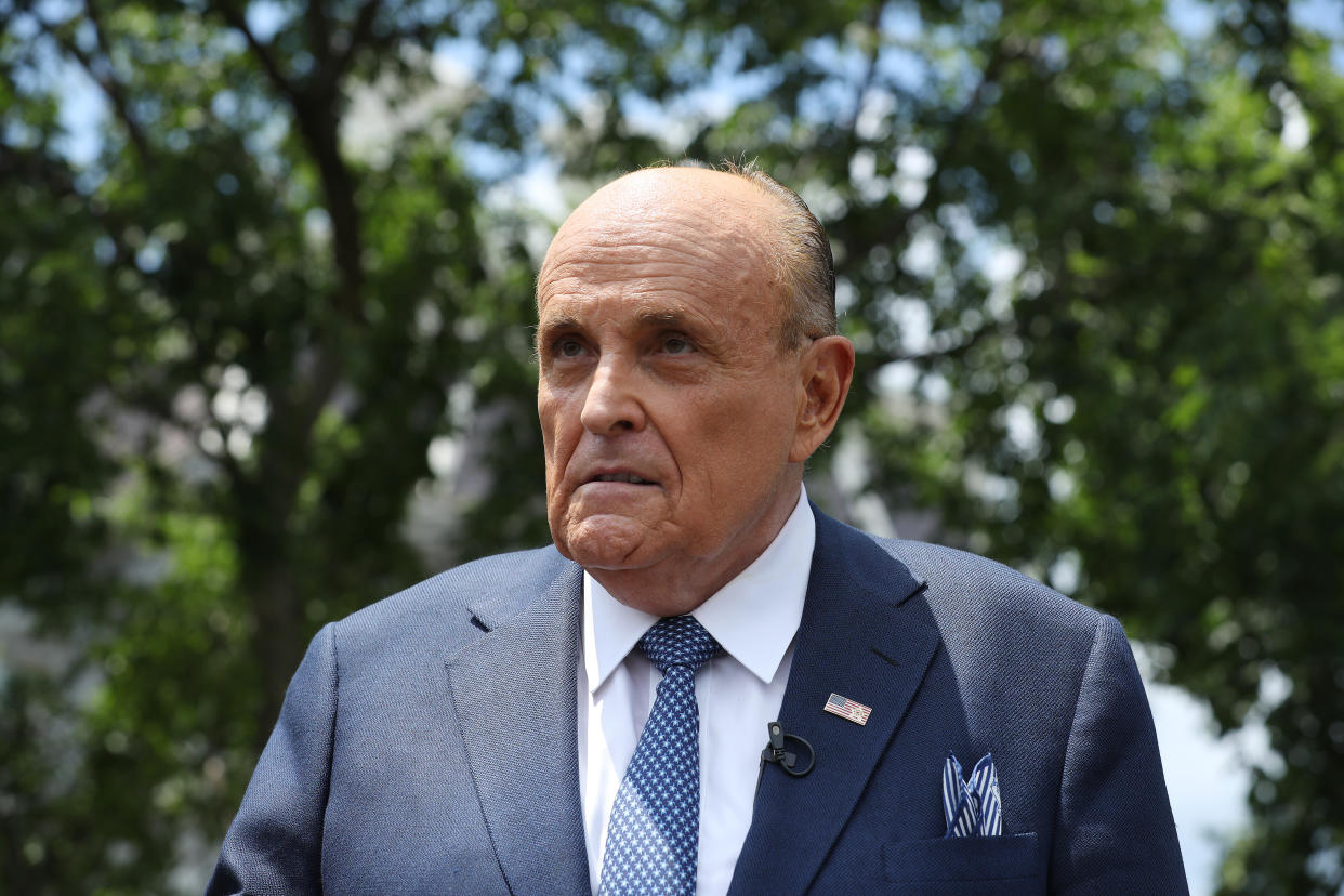 WASHINGTON, DC - JULY 01: President Donald Trump's lawyer and former New York City Mayor Rudy Giuliani talks to journalists outside the White House West Wing July 01, 2020 in Washington, DC. Giuliani did an on-camera interview with One America News Network's Chanel Rion before talking to other journalists about Vice President Joe Biden and the news that Russian intelligence may have paid Taliban operatives to kill U.S. troops in Afghanistan. (Photo by Chip Somodevilla/Getty Images)