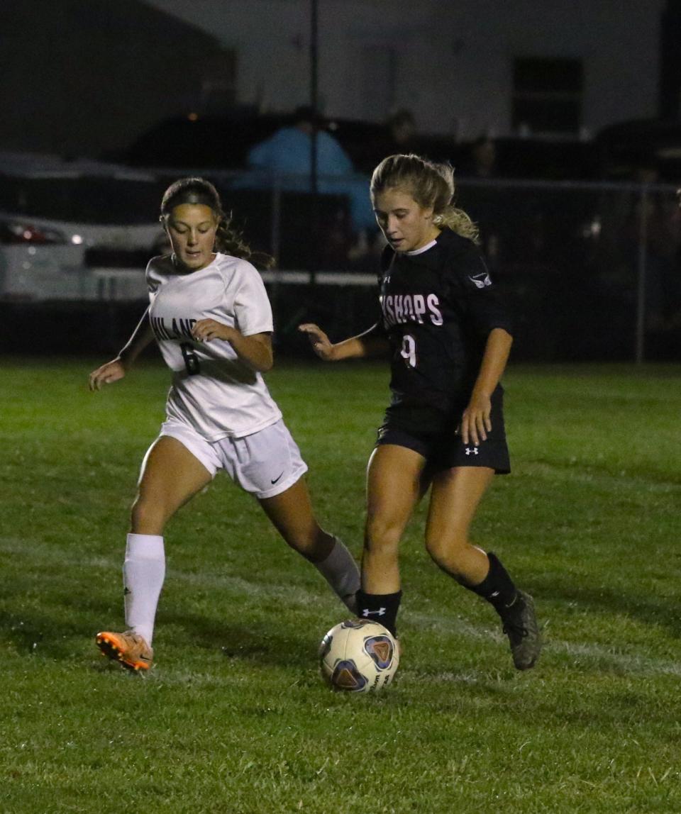 Rosecrans' Sydnee Maxwell is guarded by Hiland's Miah Miller during Wednesday's Division III sectional match. Maxwell was recently named All-Central Region by the United Soccer Coaches.