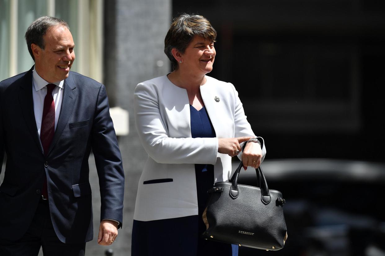 Arlene Foster arrives at Downing Street with the DUP's Westminster leader Nigel Dodds: Getty Images