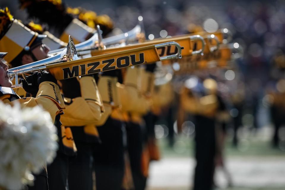 Marching Mizzou members perform during a football game in 2019.