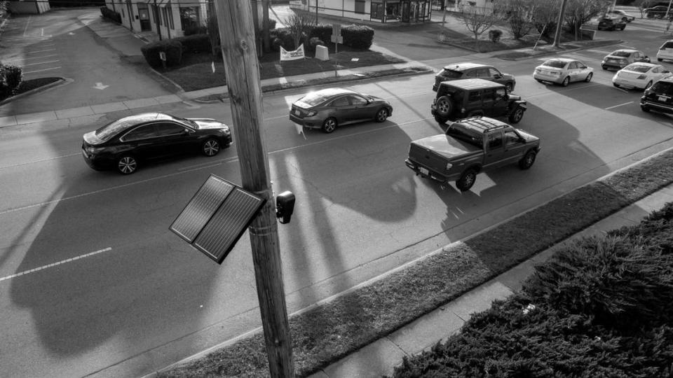 A Flock automated license plate reader camera used by the Raleigh Police Department is mounted on a Duke Energy utility pole on Hillsborough Street. The cameras record license plate numbers and details on vehicles’ color, make, model and bumper stickers.