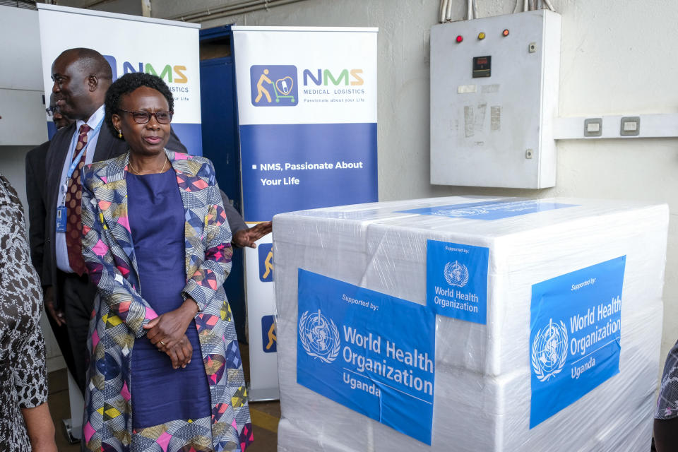 Uganda's Minister of Health Jane Ruth Aceng receives boxes containing one of three candidate vaccines against the Sudan strain of the Ebola virus, in Entebbe, Uganda Dec. 8, 2022. / Credit: Hajarah Nalwadda/AP