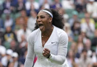 Serena Williams of the US celebrates after winning a point against France's Harmony Tan in a first round women's singles match on day two of the Wimbledon tennis championships in London, Tuesday, June 28, 2022. (AP Photo/Alberto Pezzali)