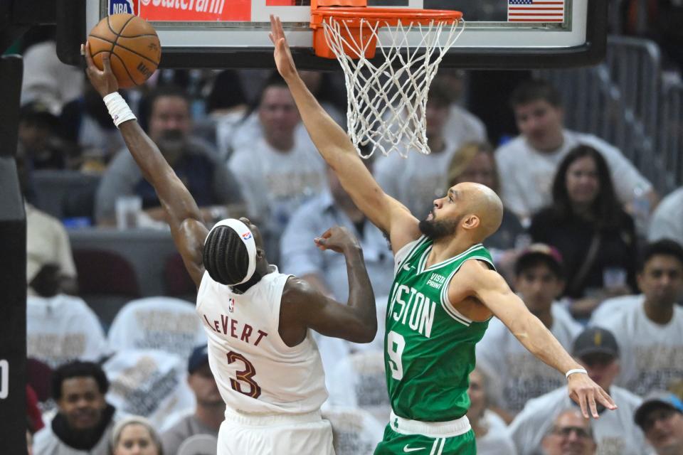 Celtics guard Derrick White defends Cavaliers guard Caris LeVert in the first quarter of Game 4 of the Eastern Conference semifinals, May 13, 2024, in Cleveland.