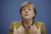 German Chancellor Angela Merkel talks to the media during a press conference on the current situation in Berlin, Germany, Thursday, Jan. 21, 2021. Topics include the decisions taken by the federal and state governments to combat the Corona pandemic, the Chancellor's upcoming virtual consultations with the heads of state and government of the European Union (EU), and relations with the United States following the inauguration of the new president. (Michael Kappeler/Pool via AP)