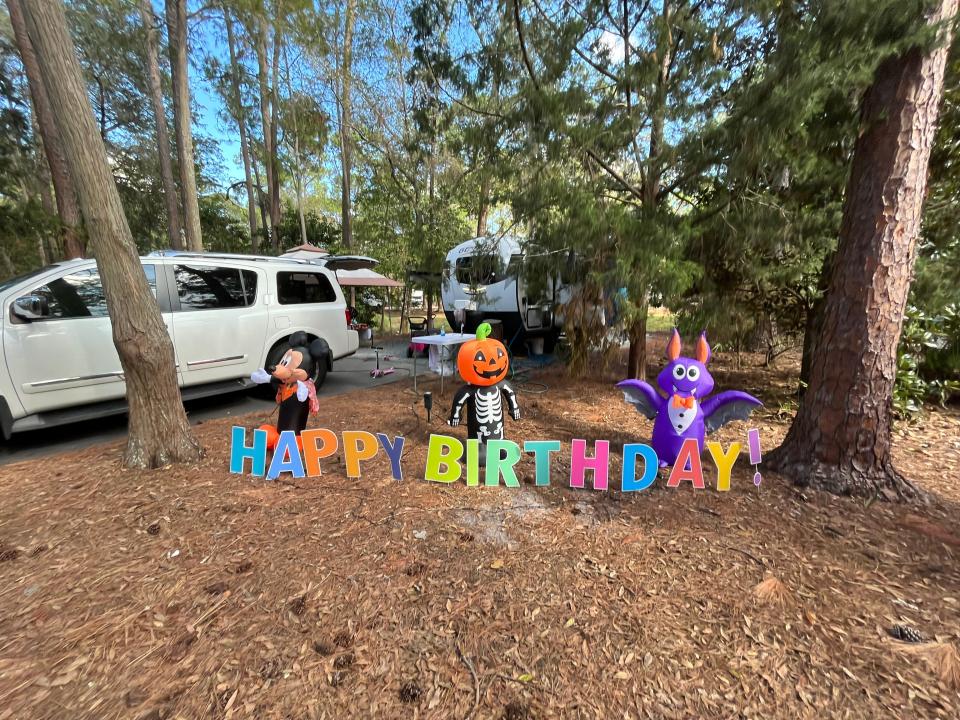 happy birthday sign on campsite