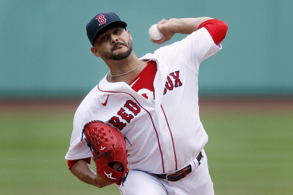 Boston Red Sox's Martin Perez pitches against the Baltimore Orioles during the first inning of a baseball game, Saturday, July 25, 2020, in Boston. (AP Photo/Michael Dwyer)