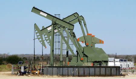 FILE PHOTO: A pump jack stands idle in Dewitt County, Texas, U.S., January 13, 2016. REUTERS/Anna Driver/File Photo