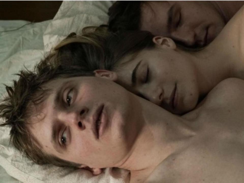 Krzysztof Baginski (front) and Michal Huszcza (back) in a scene with Eva Lebeuf in 'All These Sleepless Nights'