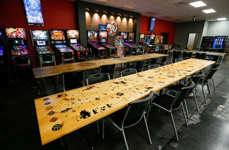 Tables used for Dungeons & Dragons and other game in the backroom of Meta-Games Unlimited.