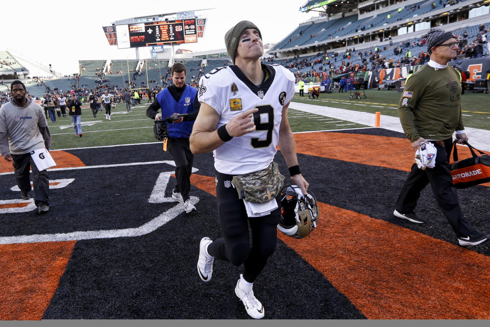 New Orleans Saints quarterback Drew Brees (9) reacts as he runs off the field following an NFL football game against the Cincinnati Bengals, Sunday, Nov. 11, 2018, in Cincinnati. (AP Photo/Frank Victores)