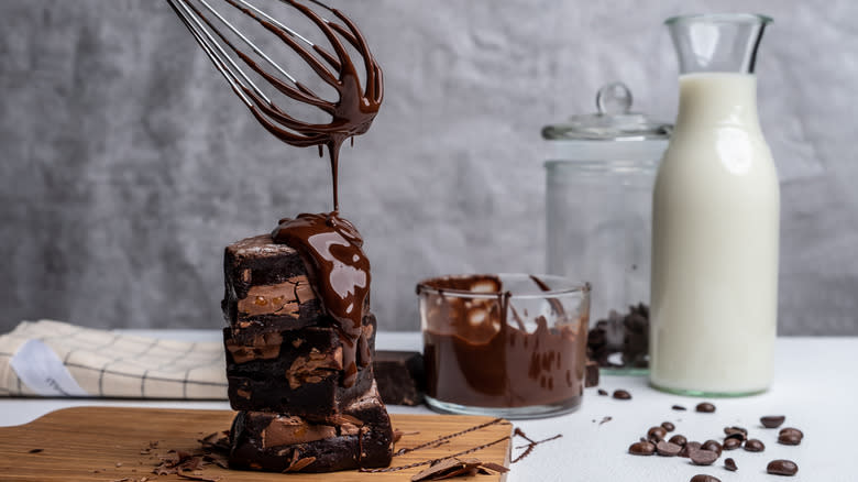 Chocolate sauce on brownies