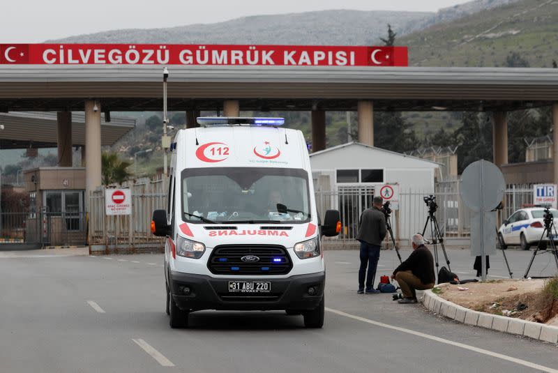 An ambulance crosses the Cilvegozu border gate in Reyhanli