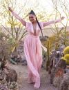 <p>Vanessa Hudgens and Oliver Trevena host Caliwater Escape in Joshua Tree at the Mojave Moon Ranch to celebrate their new cactus water, presented by Outdoorsy, on Friday.</p>