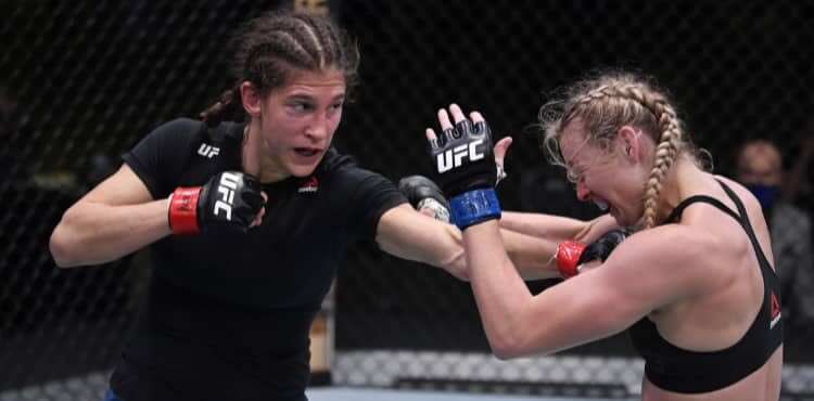 Roxanne Modafferi lands a hard shot on Andrea Lee