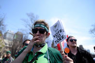 <p>A participant smokes marijuana during the Toronto Global Marijuana March 2018 on May 5, just a few months before Canada legalizes marijuana. (Photo from Arindam Shivaani/NurPhoto via Getty Images) </p>